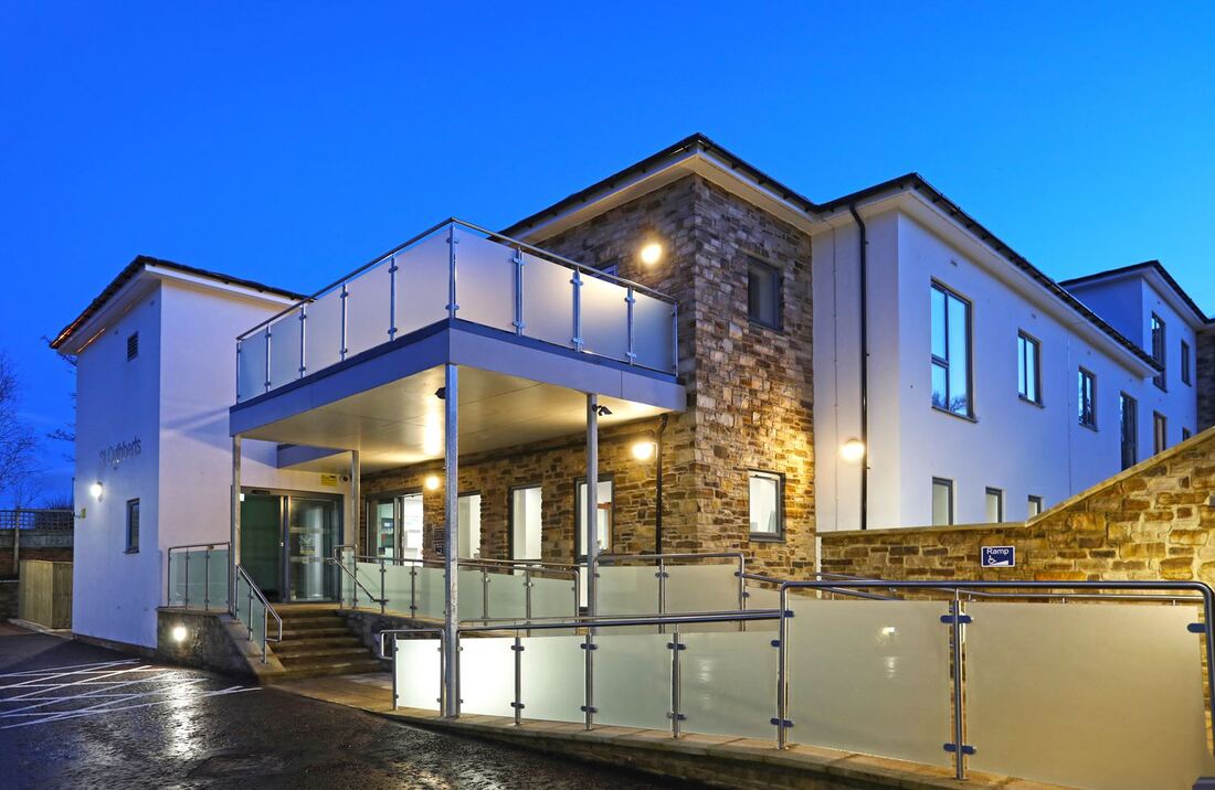 Photo of the front elevation of the completed St. Cuthbert's for Karbon Homes
